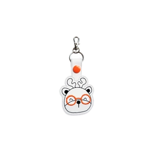A white faux leather deer keyring with an embroidered smiling deer wearing round glasses, finished with a metal ring and lobster clasp.