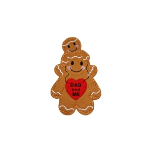 A felt gingerbread dad and child character stacked together, holding a red heart stitched with the words ‘Dad and Me’, with smiling faces and stitched details.