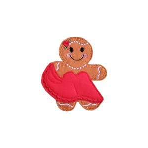 A handmade felt gingerbread lady character dressed in a flowing red ballroom gown with embroidered white bead details and a red flower in her hair, smiling brightly.