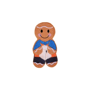 A smiling gingerbread delivery character holding a parcel, with stitched details, a blue top, black trousers, and a friendly expression.