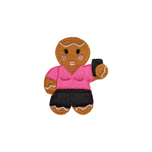 A felt gingerbread girl character holding a mobile phone, with a smiling face, stitched details, a pink top, and a black skirt.