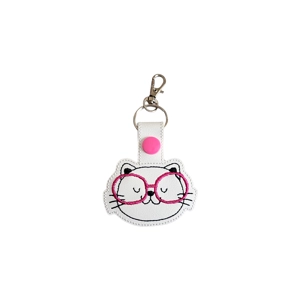 An embroidered kitty keyring with a sleepy cat face wearing pink glasses, finished with a silver keyring and lobster clasp.
