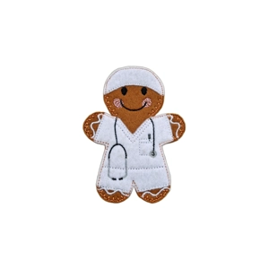 A felt gingerbread anaesthetist character wearing a white uniform and cap, with an embroidered stethoscope around the neck.