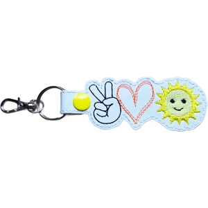 White Sunshine Peace Love keyring made from faux leather, featuring a peace sign hand, stitched orange heart and smiling sunshine design with sturdy metal ring and lobster clasp.