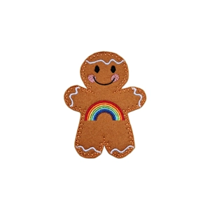 A felt gingerbread character with a smiling face and rosy cheeks, featuring a colourful embroidered rainbow stitched onto the body.