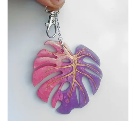 Pink and mauve monstera leaf keychain, epoxy