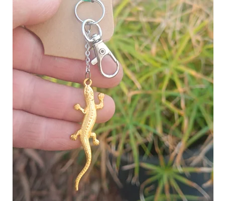 Lizard keychain, golden color, metal