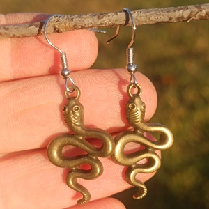 Snake earrings, golden color