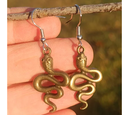 Snake earrings, golden color