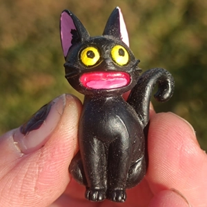 Feed me cat magnet, black