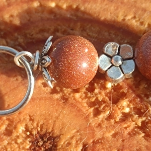 Goldstone bracelet, Ambition