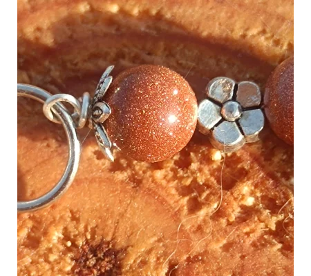 Goldstone bracelet, Ambition