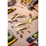 Brass-tone picture hangers with screws 50p a pack