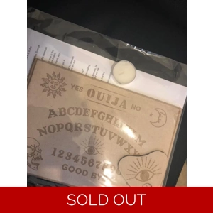 Ouija board with instru..