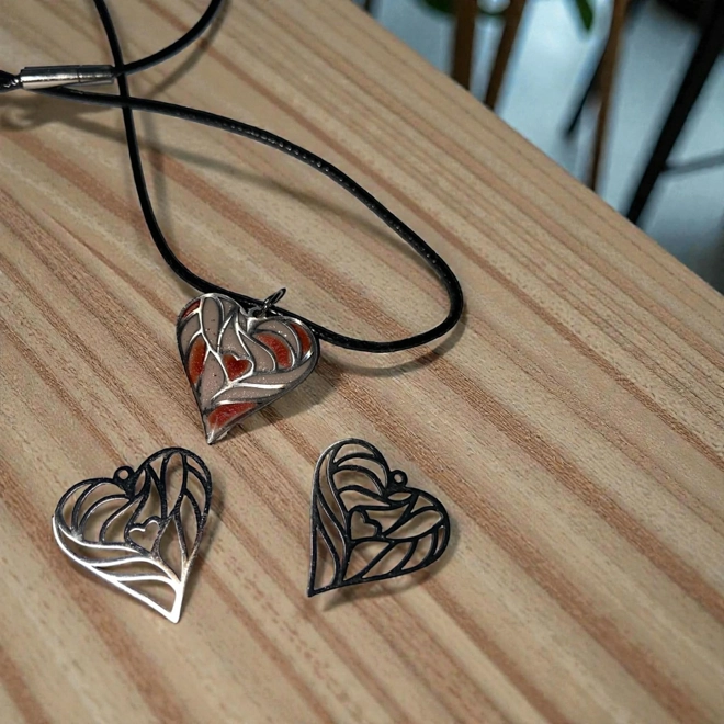 product Image for GREY SILVER SECTIONED HEART PENDANT