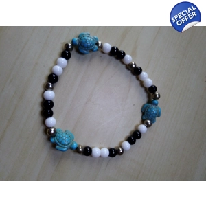 Black, White and Turquoise Turtle stretch bracelet