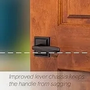 Angled view of the hand-rubbed bronze finish on Baldwin passage lever.