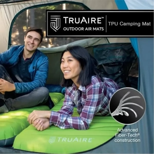 ntex TruAire green luxury inflatable camping mat inflated on outdoor ground.
