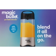 Smoothie blended in portable cup with flip top lid open.