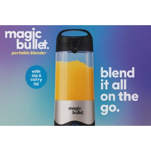 Smoothie blended in portable cup with flip top lid open.