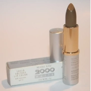 The discontinued Mary Kay Lip Color Sheer Voltage lipstick in the shade Cosmic (2992), a .13 oz tube with SPF 15.