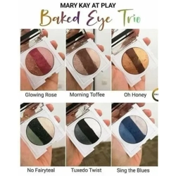 A collection of different Mary Kay At Play Baked Eye Trio compacts, showing the variety of available color palettes.