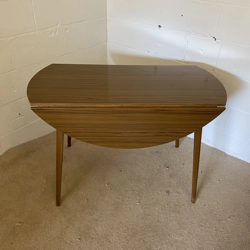 Formica Double leaf Circular table