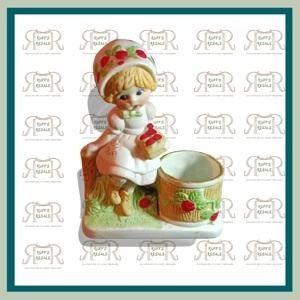Strawberry Girl Sitting on Bench