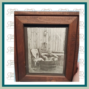 Wood Frame Picture of man in tub
