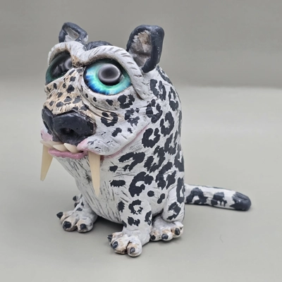 Sabertooth Snow Leopard Sabertooth Snow Leopard