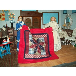 Star quilt on red or dark blue