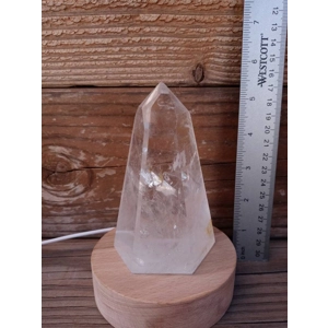5.5" Clear Quartz Crystal Point Lamp. Polished Quartz Crystal with Wood LED Light Base. You get this