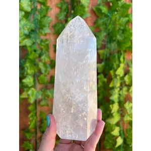 1.88 Lb. Clear Quartz Crystal Point. 6.4 Inch Clear Polished Quartz Crystal Point. You get this piec