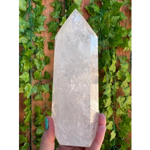 1.88 Lb. Clear Quartz Crystal Point. 6.4 Inch Clear Polished Quartz Crystal Point. You get this piec