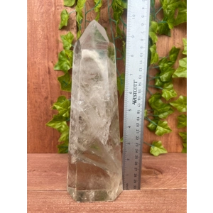 3.45 Lb Clear Quartz Crystal Point. 7.5 Inch Clear Polished Quartz Crystal Point. You get this piece