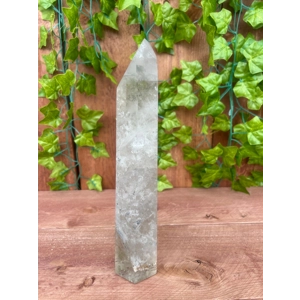3.45 Lb Clear Quartz Crystal Point. 7.5 Inch Clear Polished Quartz Crystal Point. You get this piece