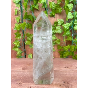 3.45 Lb Clear Quartz Crystal Point. 7.5 Inch Clear Polished Quartz Crystal Point. You get this piece