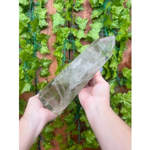 3.45 Lb Clear Quartz Crystal Point. 7.5 Inch Clear Polished Quartz Crystal Point. You get this piece