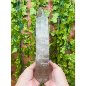 3.45 Lb Clear Quartz Crystal Point. 7.5 Inch Clear Polished Quartz Crystal Point. You get this piece