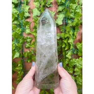 3.45 Lb Clear Quartz Crystal Point. 7.5 Inch Clear Polished Quartz Crystal Point. You get this piece