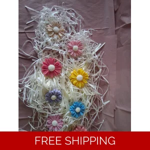 Multi-colored daisy candles