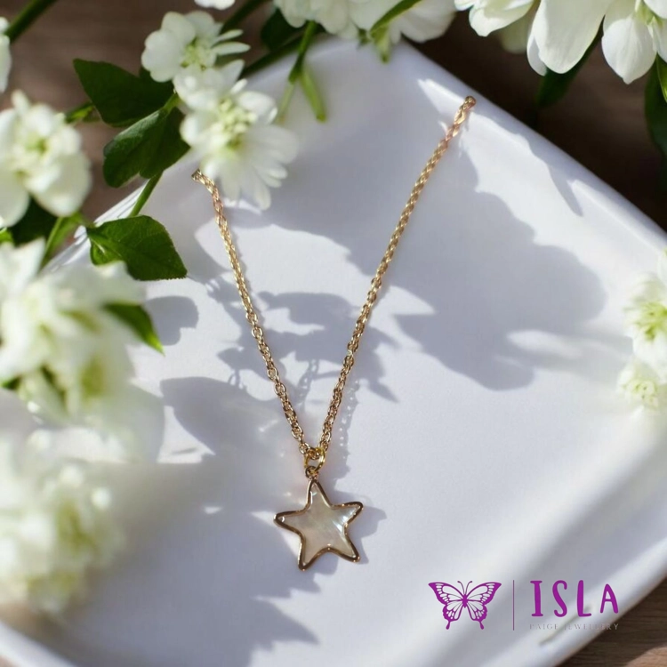 Gold star pearl necklace