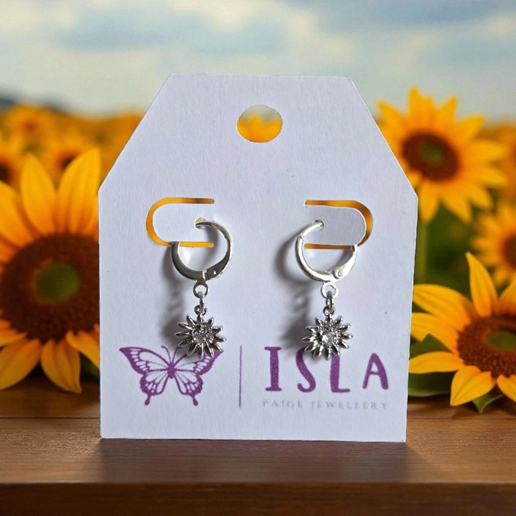 Silver sunflower huggie hoops