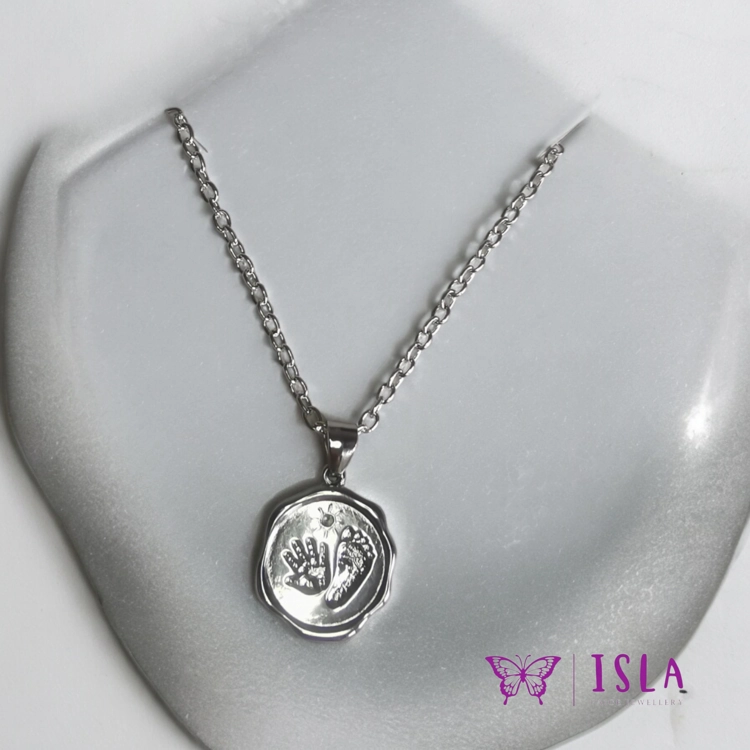 Silver baby hand and fo..