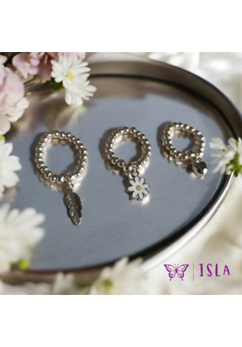 Silver beaded ring with charm