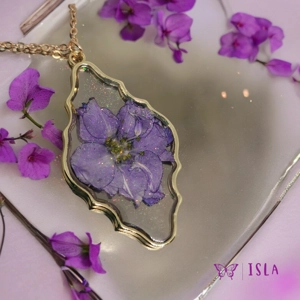 Gold and purple resin f..