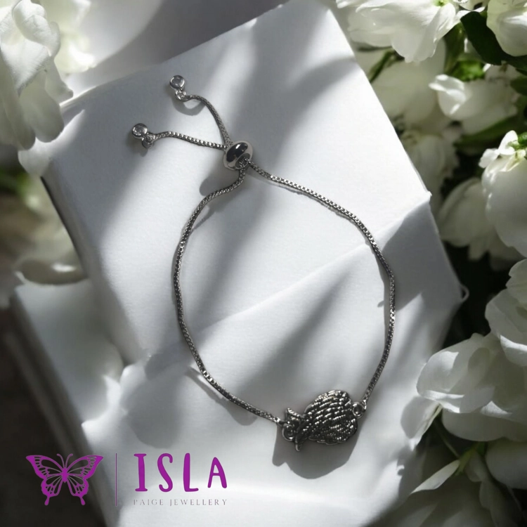Silver angel wing adjustable..