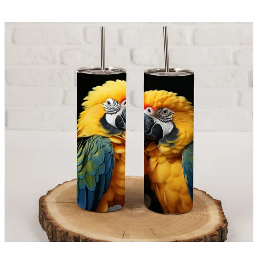 This beautifully designed 20oz tumbler features a charming image of two parrots standing next to each other. The vibrant colours of the parrots pop against the sleek background