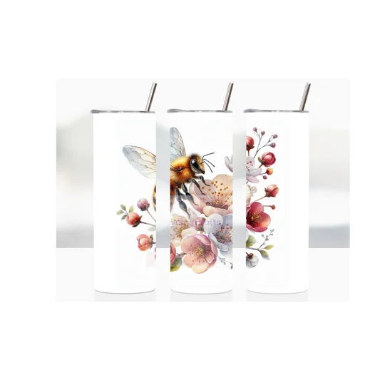 Introducing 'Nectar Haven' our exquisite 20oz Skinny Tumbler, a perfect companion for those who appreciate the beauty of nature and seek a touch of elegance in their everyday life. This stunning tumbler features a captivating image of a bee gracefully hovering over a bed of vibrant flowers, all set against a pristine white background