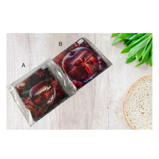 This unique slate coaster features a stunning sublimation print of a Highland cow inside a glass apple, making it a truly eye-catching addition to any home decor